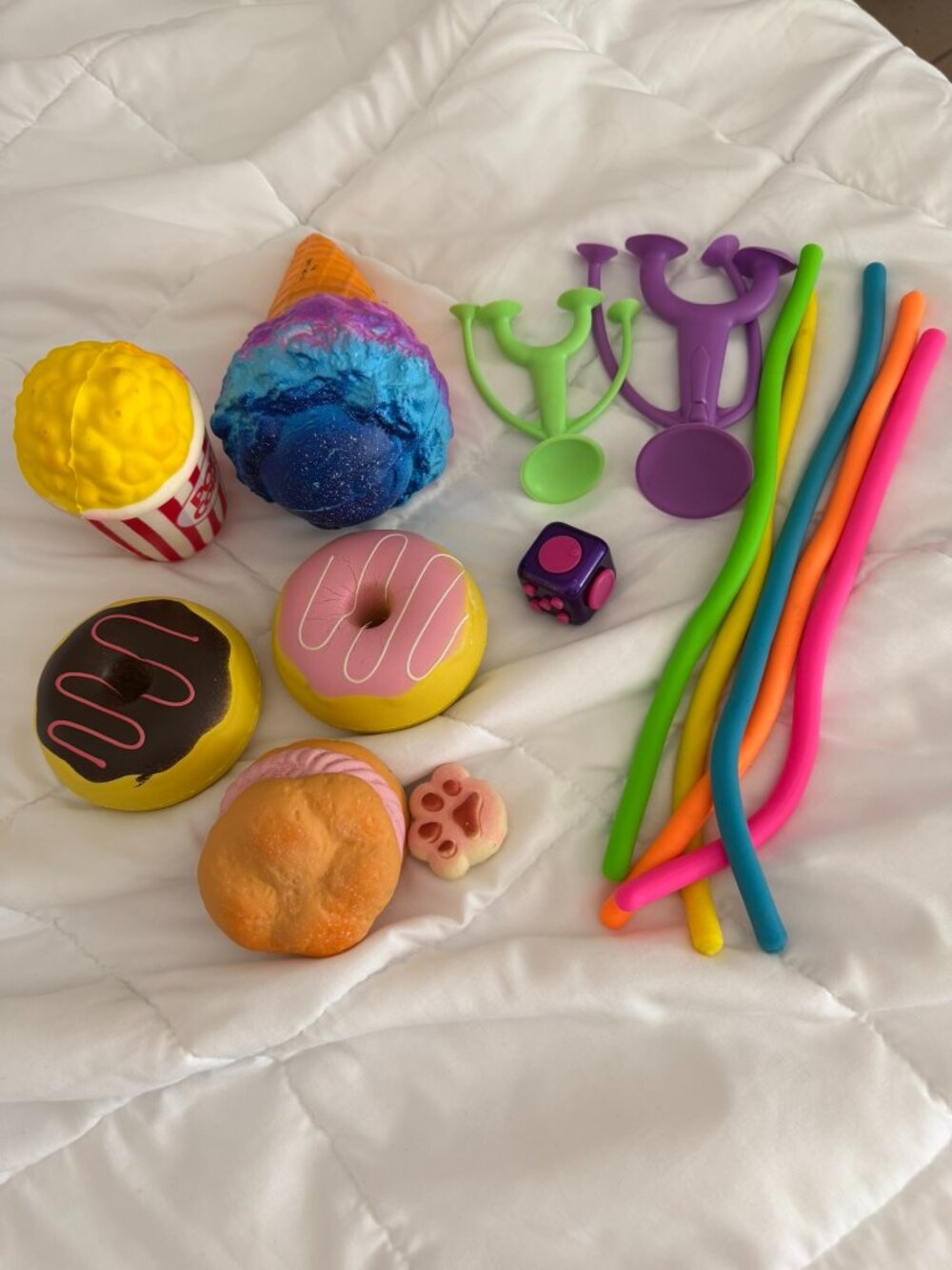 Squishes & fidget 13 piece lot Ice cream cone Donut Pop corn Paw Noodles +